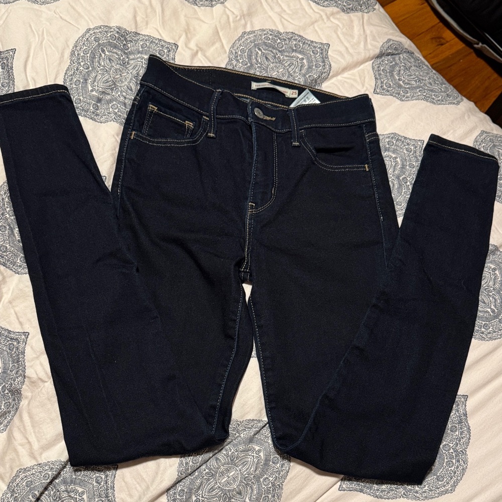 720 High Rise Super Skinny Size 25